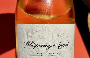 Wednesday Wines article celebrating Whispering Angel’s 20th vintage, featuring detailed tasting notes and high scores for Whispering Angel, Les Clans, and Garrus.